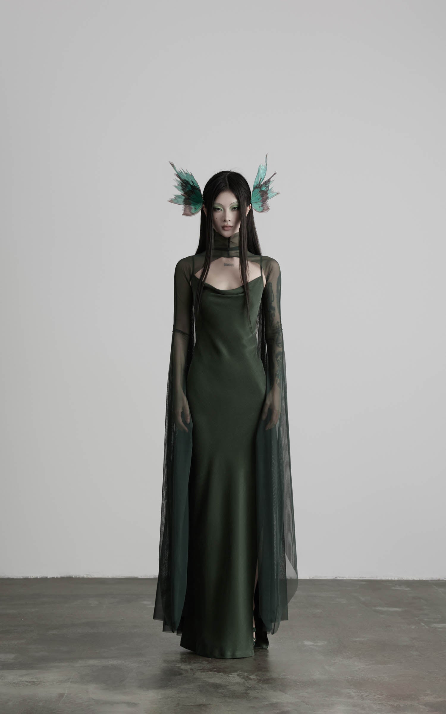 Dark green slip maxi dress with mesh cape full front view