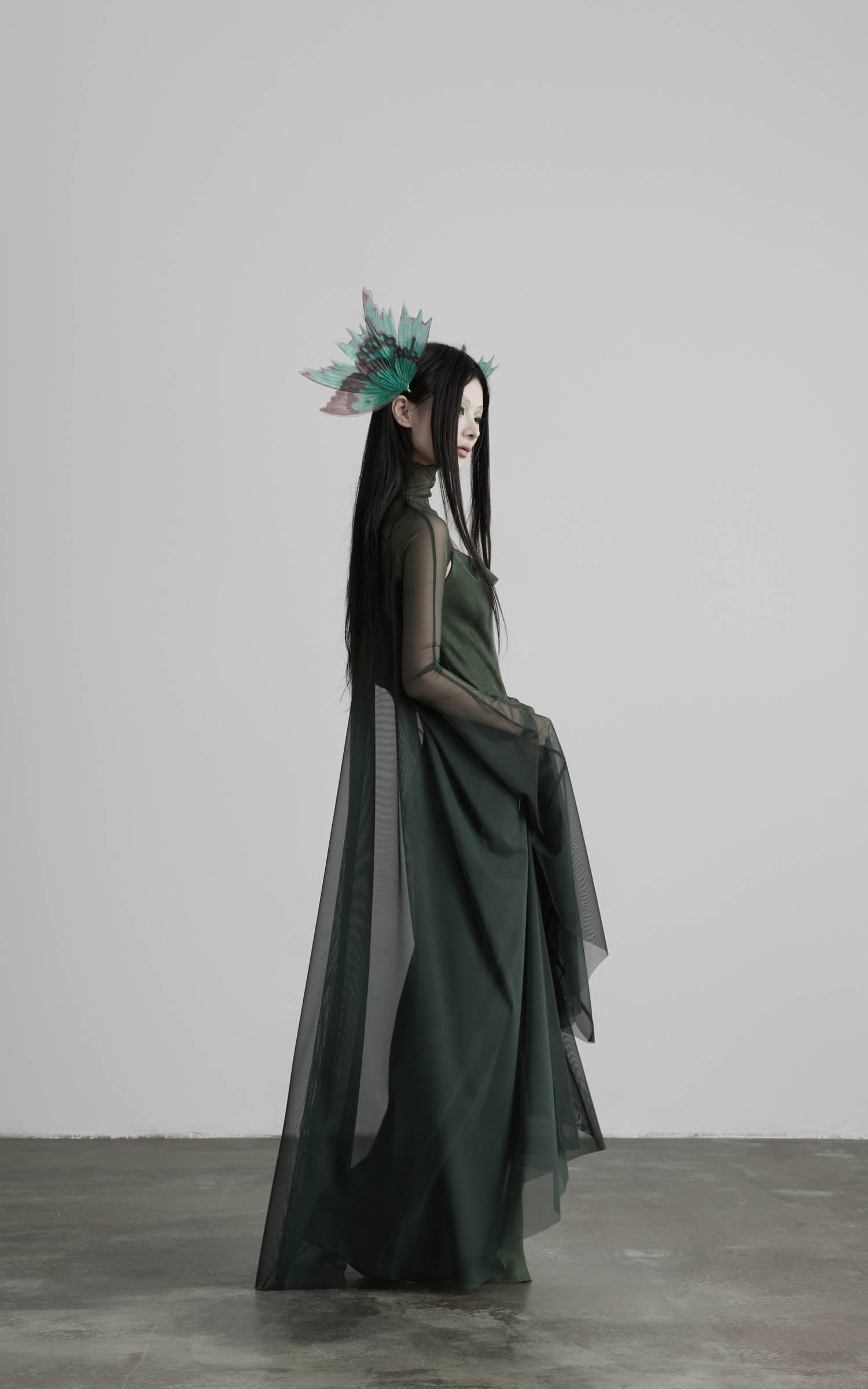 Dark green slip maxi dress with mesh cape side view