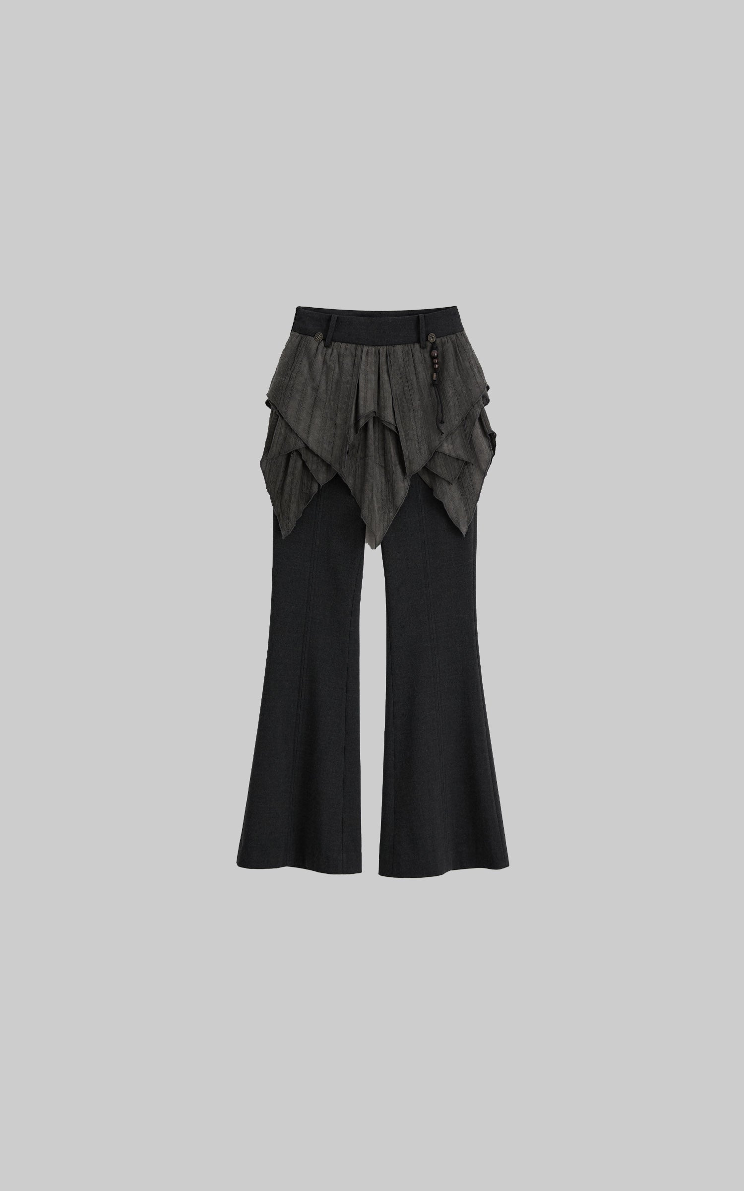 front view of layered flare pants in black with draped waist panels