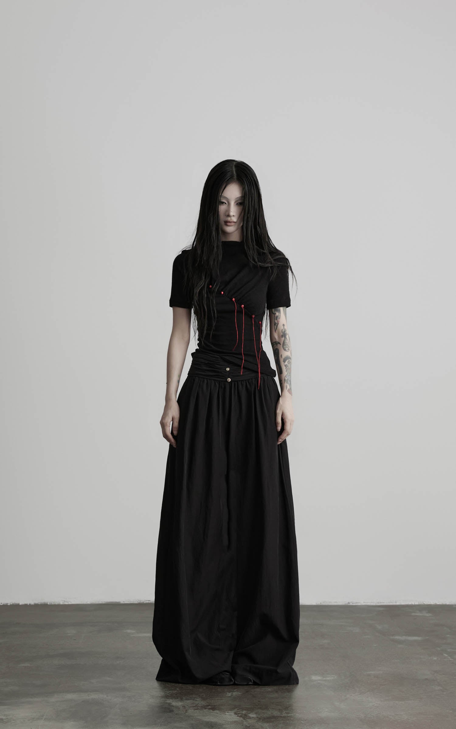 Black mock neck ruched knit T-shirt with gathered waist front view