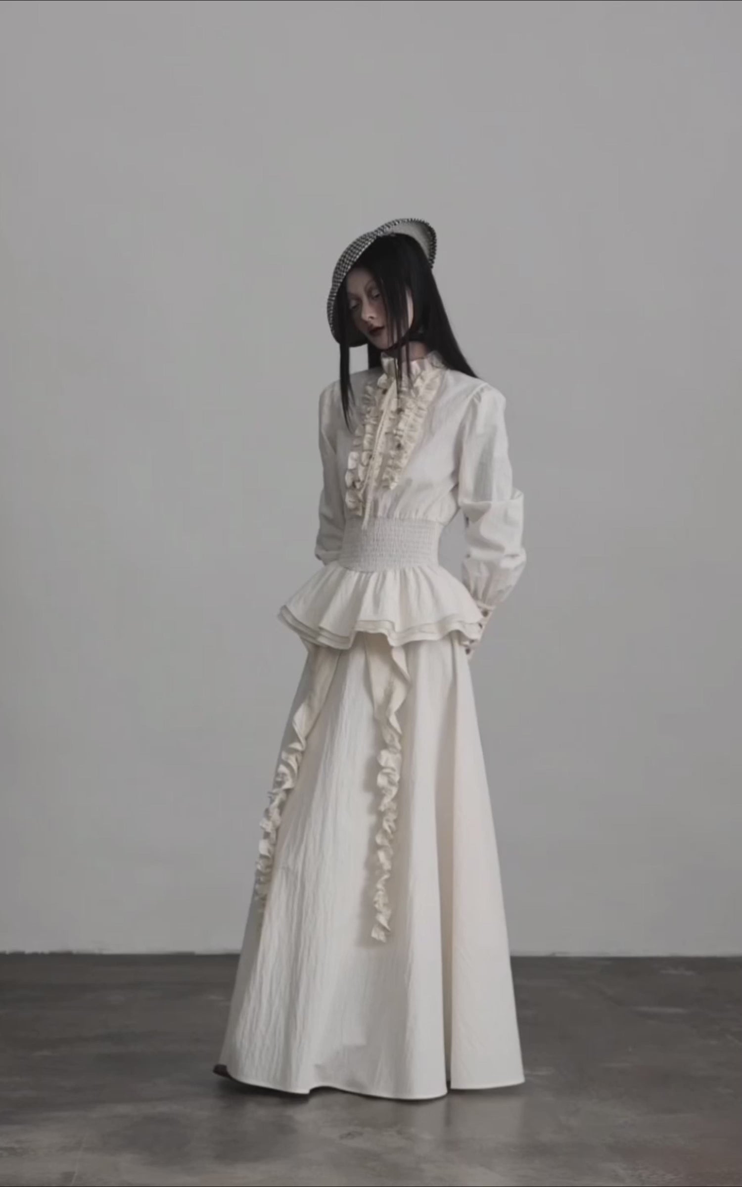 Load video: DOINDULGE Ruffled High-Neck Smocked Waist Long Sleeve Blouse