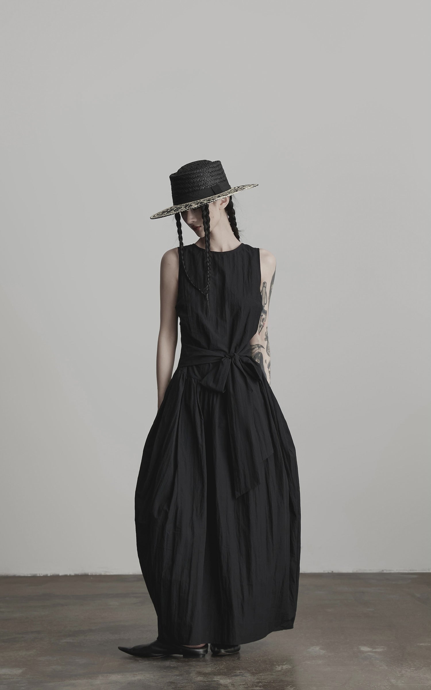 Load video: INDULGE Sleeveless Draped Maxi Dress with Hand-Tied Bead Embellishment and Sculpted Waist