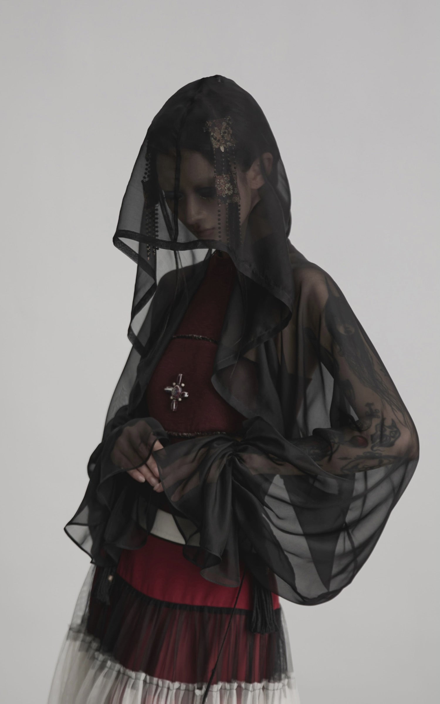 Load video: INDULGE Draped Mesh Hooded Cardigan with Tassel Accents and Voluminous Sleeves
