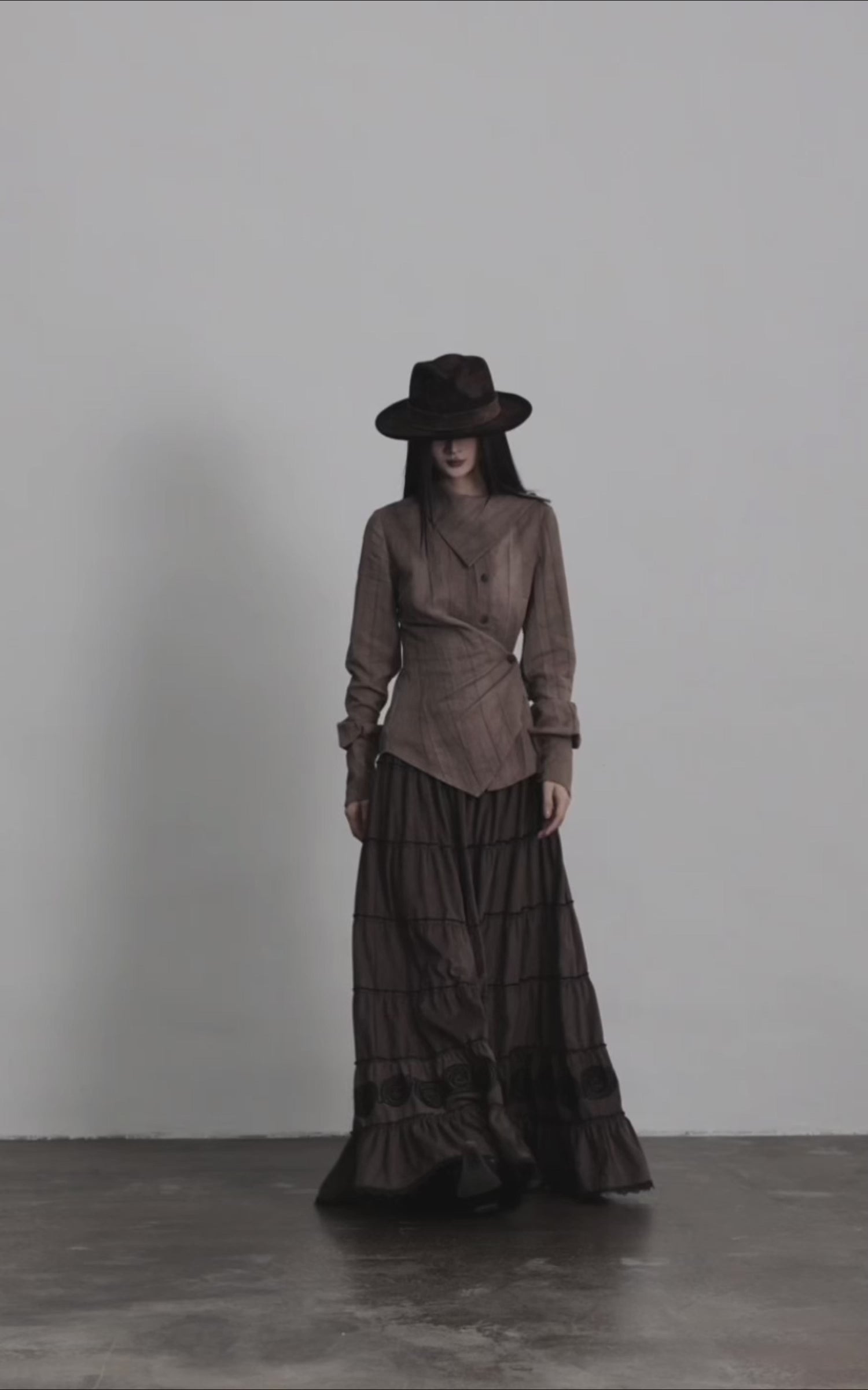 Load video: DOINDULGE Asymmetric Sculpted Waist Shirt