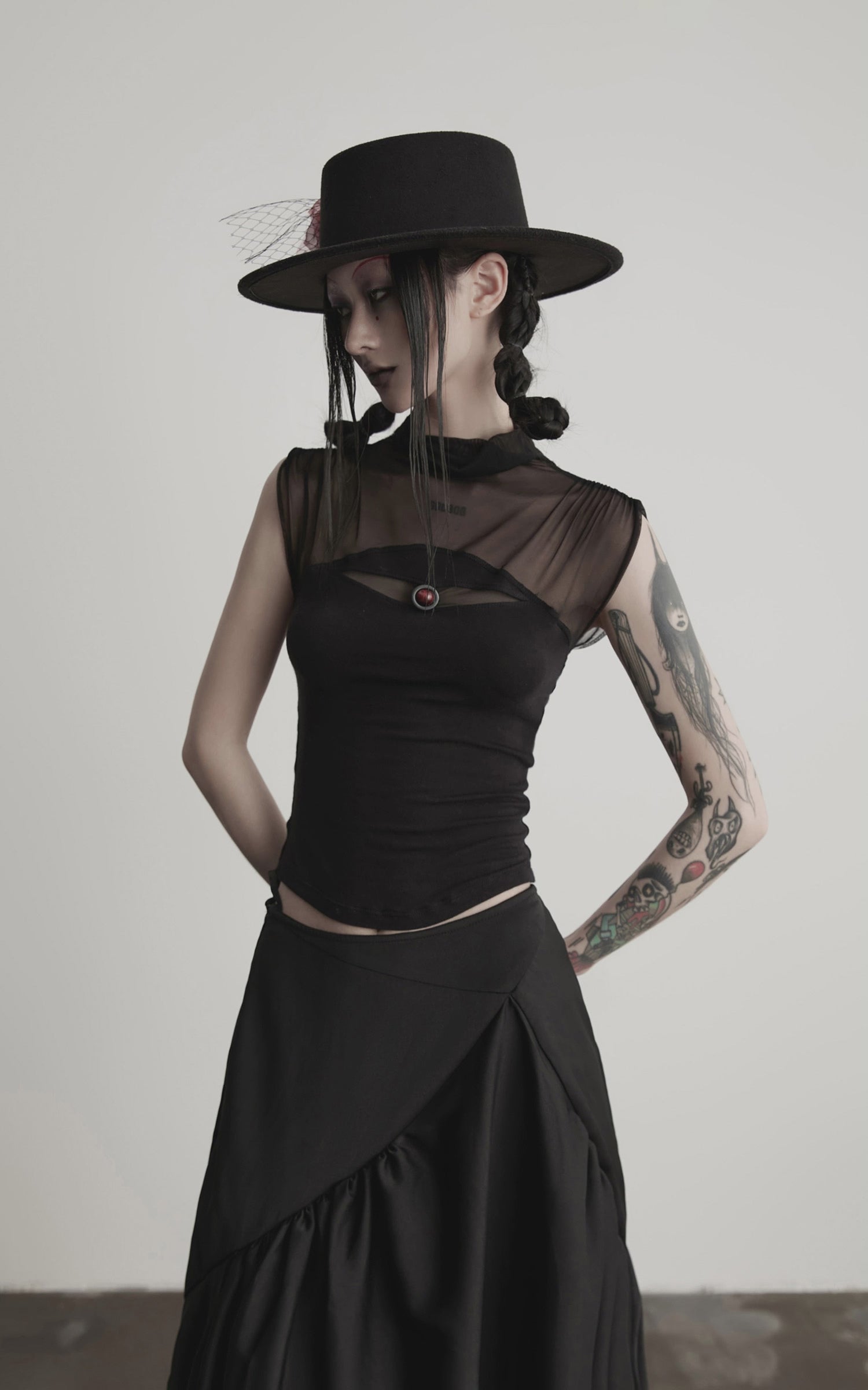 Load video: INDULGE IN Gothic Mesh Paneled Sleeveless Top with Red Orb Detail