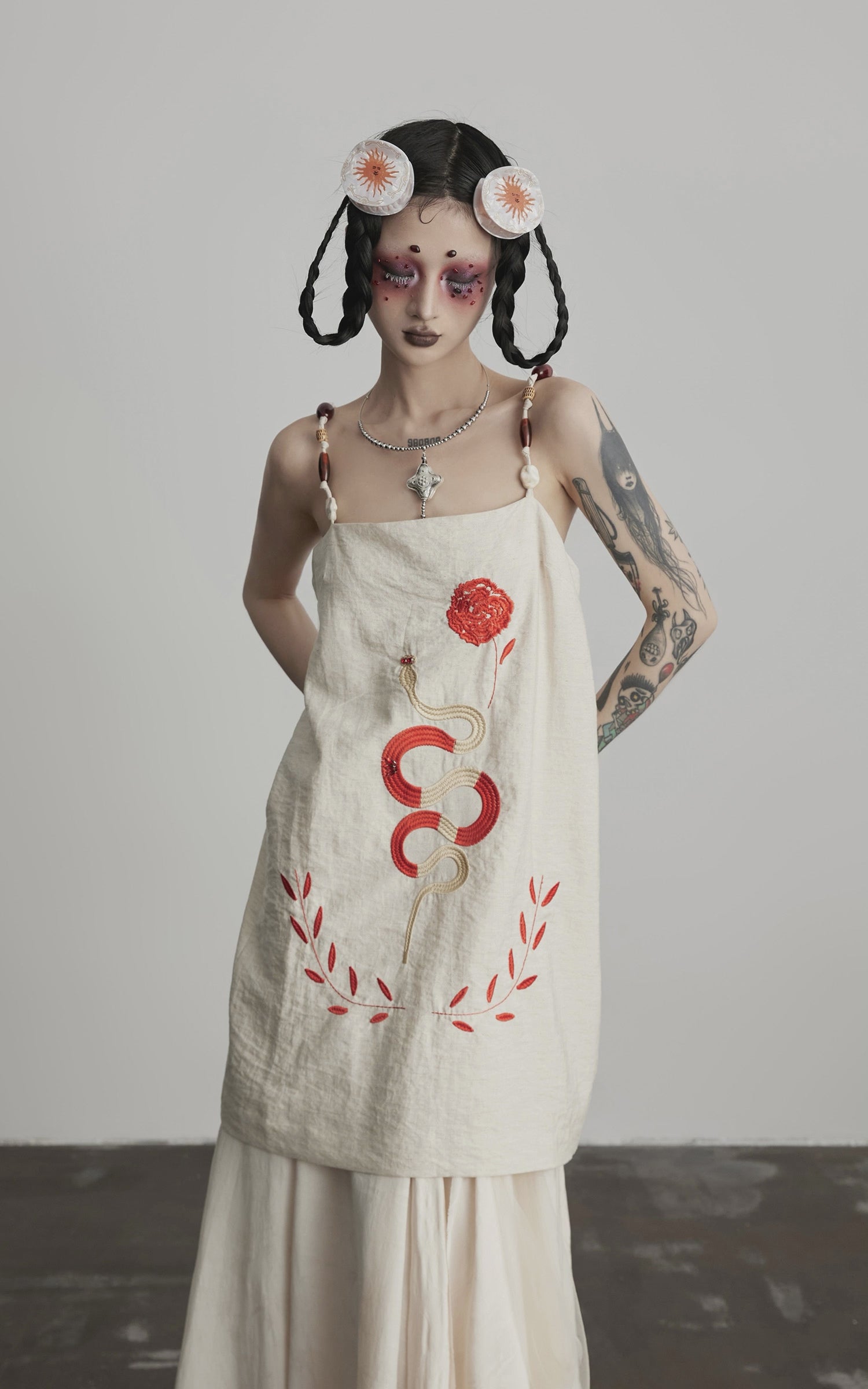 Load video: INDULGE Embroidered Snake and Flower Layered Linen Dress