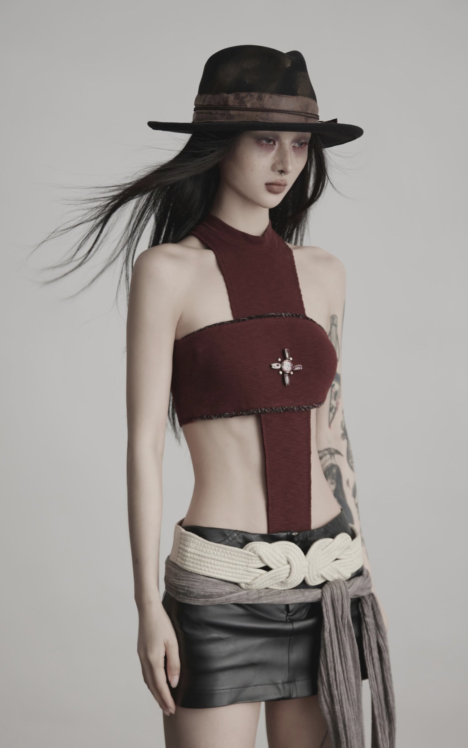 Load video: INDULGE Asymmetric Cutout Bodysuit with Ceramic Cross Embellishment