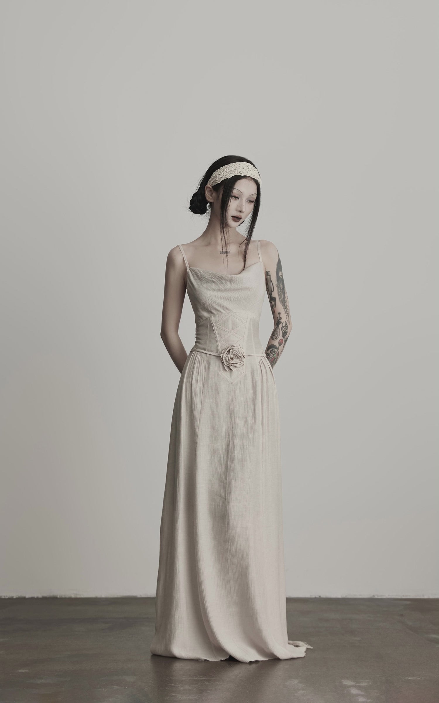 Load video: INDULGE Draped Maxi Dress with Corset Waist and Rosette Detail