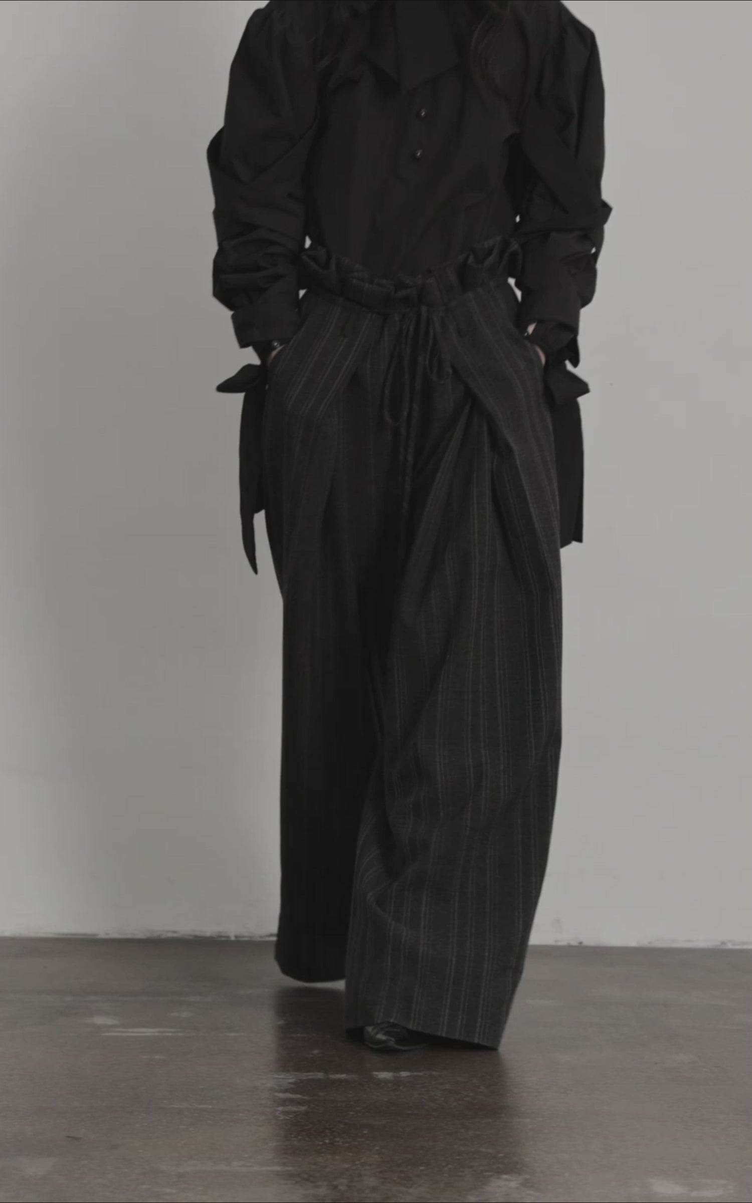 Load video: DOINDULGE High-Waist Pleated Pinstripe Wide Leg Trousers