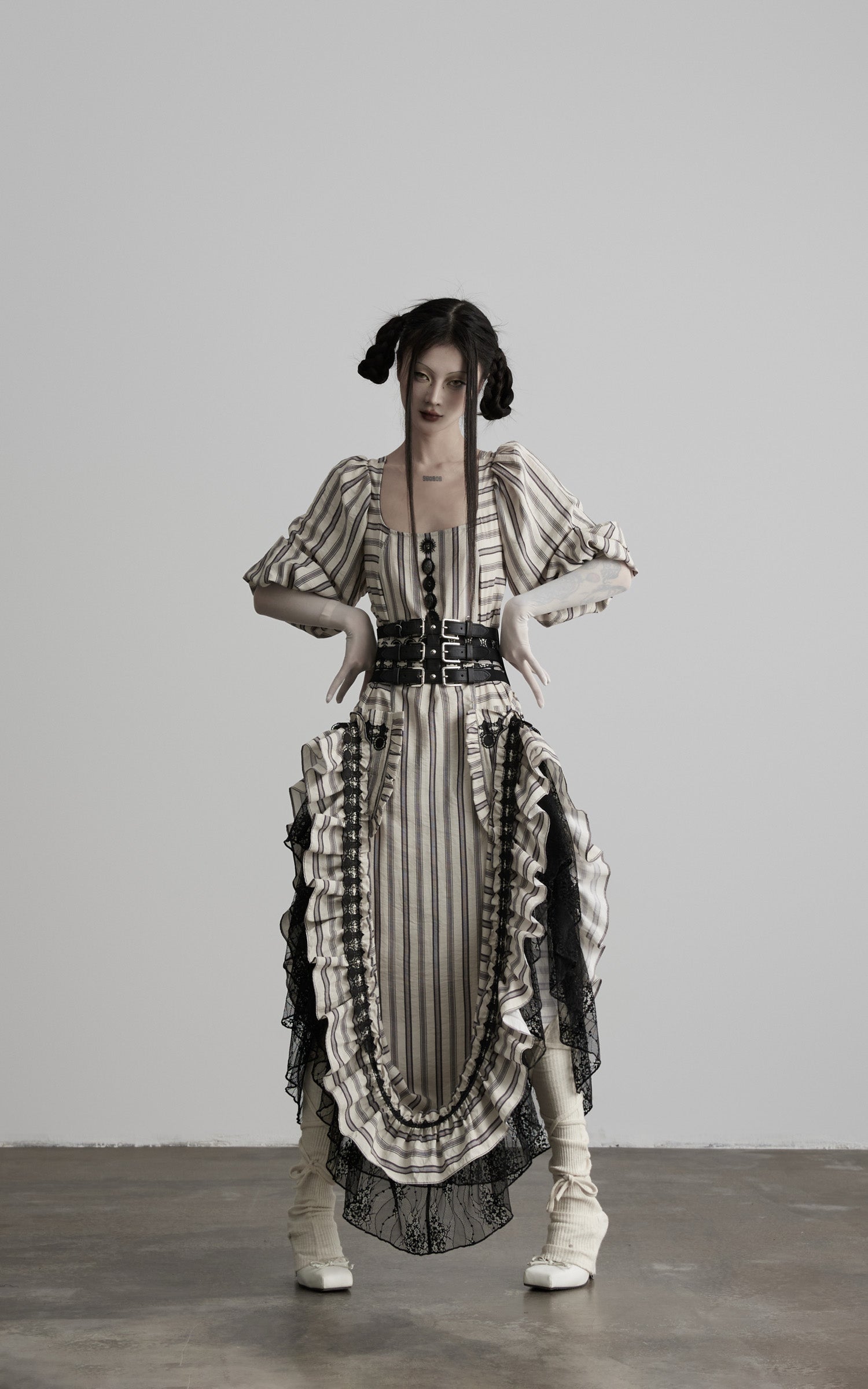 front view of beige striped maxi dress with button front detail