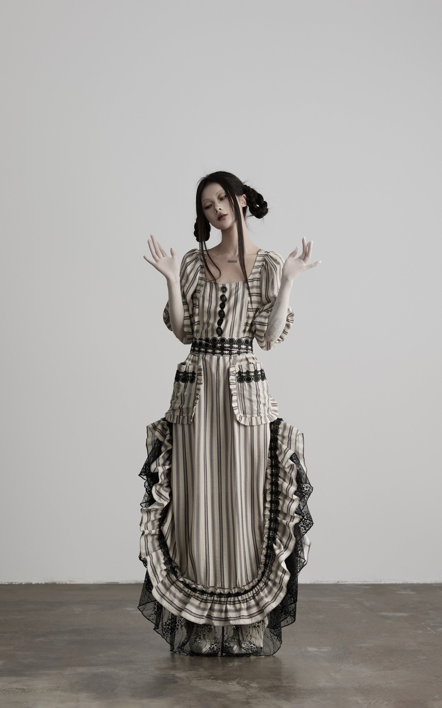 front view of beige striped maxi dress with vertical stripe pattern