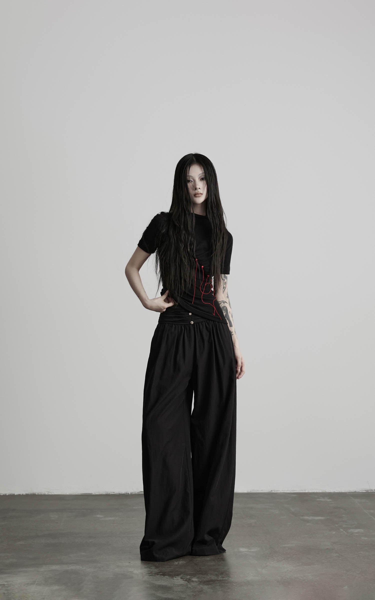 Black wide leg gathered waist pants relaxed full outfit view
